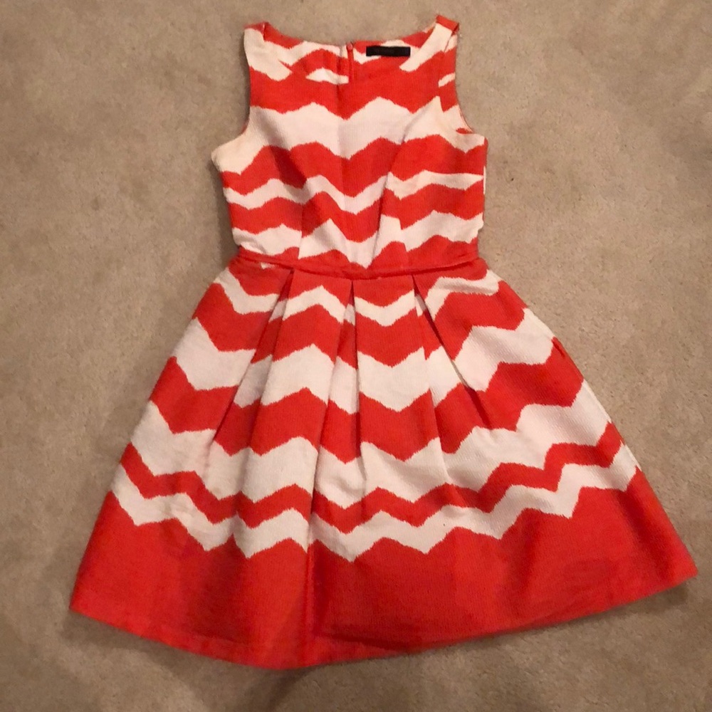 The limited orange and white chevron dress
